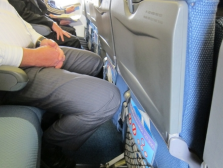 cramped airline seat